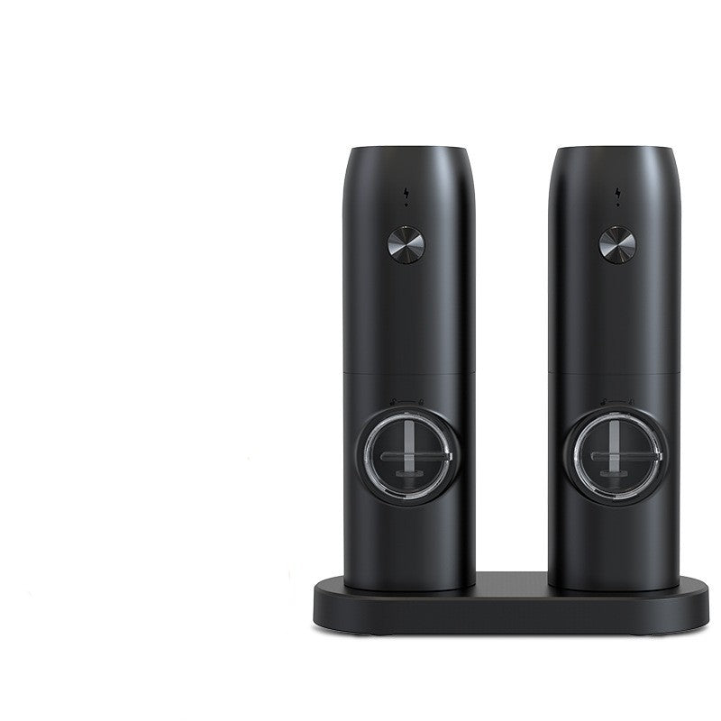 Two black electronic devices on a white background